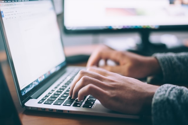 A person at a computer using elearning.